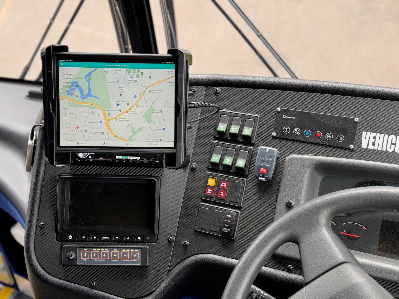 Photo of an iPad running Busminder Bus and student tracking software