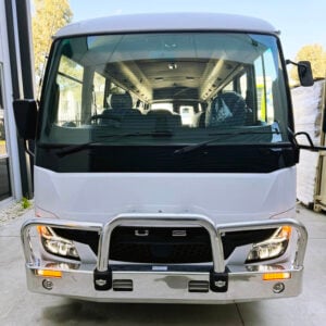 Photo of the front of a 2024 5th generation BE7 Mitsubishi Rosa bus with a Safebus Bullbar fitted